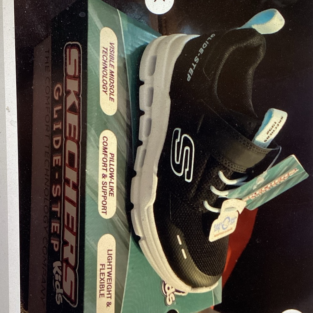 Skechers Kids Black and White Glide-Step Sneaker with Blue Accents